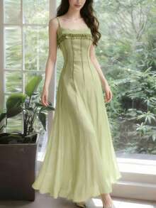 Vestido ajustado con volantes en el bajo en color verde salvia, vestido formal elegante sin mangas de gasa para fiesta, vestido ajustado de línea A y longitud hasta el té, ropa de playa de verano para boda y primavera - Verde Oliva - Ver 1