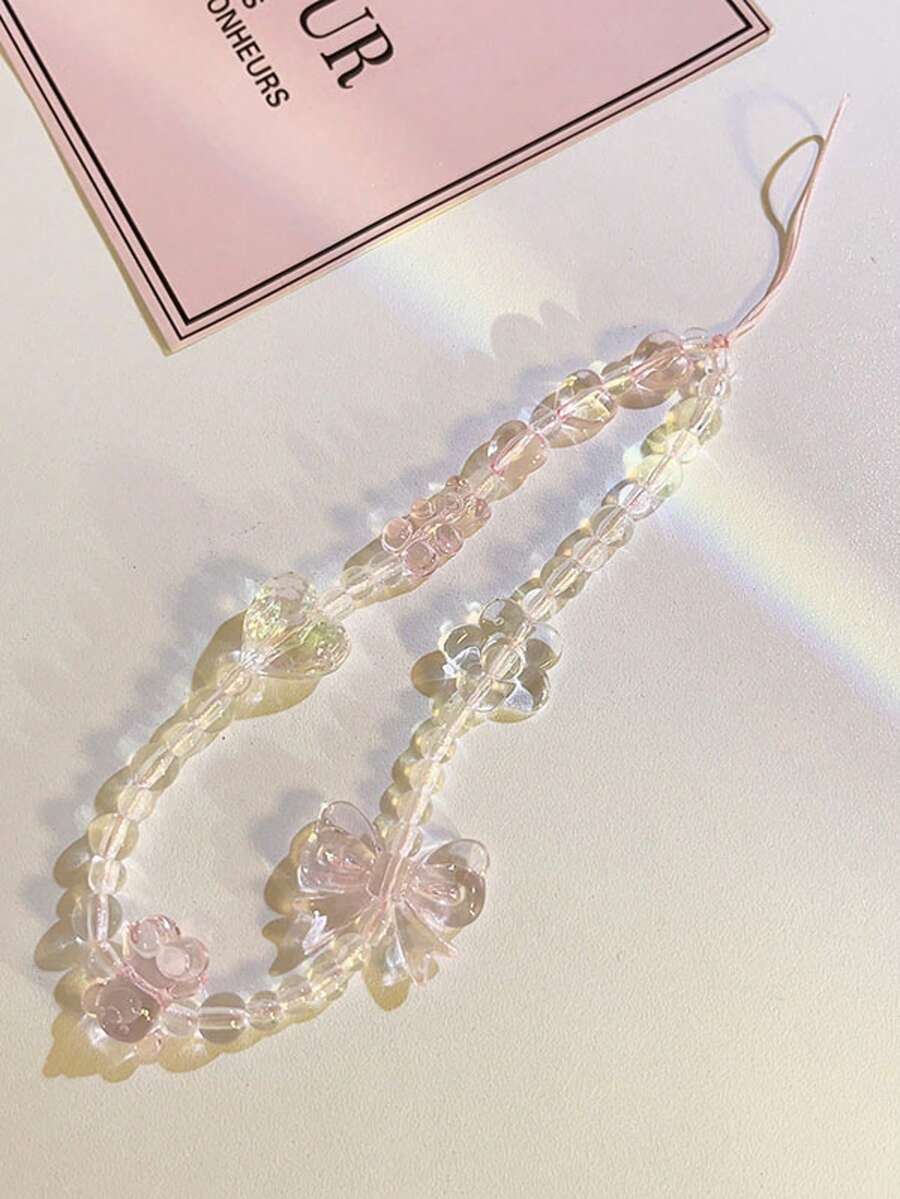 2 piezas Colgante de oso con lazo rosa iridiscente transparente, colgante universal anti-pérdida con cuentas de corazón y flor para bolsa de teléfono (debido al ángulo de disparo y la ampliación, el tamaño real del objeto puede diferir ligeramente de la foto) colgante de teléfono, regalo festivo, colgante para tarjetero