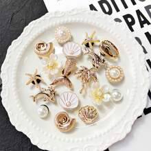18pcs Gold Ocean Series Accessories, Gold Shells Suitable For Beach Decor, Shoe Buckles, DIY Shoe Charms, Fashionable And Elegant, Suitable For Perforated Sandals, Slippers, Perfect As Holiday Gifts - Gold - View 1