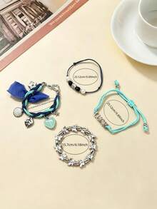 4 pezzi Braccialetto da donna stile bohémien multicolore con corda intrecciata in cera, cerchio geometrico, cuore, fiore, farfalla, foglia, lettera e perle finte, regolabile a più strati - Braccialetto carino, elegante, premium e versatile adatto per l'uso quotidiano o come regalo per le vacanze - Multicolore - Visualizzare 2