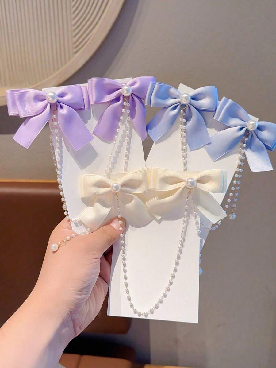 2 pezzi Fermagli per capelli con fiocco in raso, bastoncini per capelli con fiocco e nappe a catena di perle, accessori decorativi alla moda per capelli da ragazza - Multicolore - Visualizzare 1
