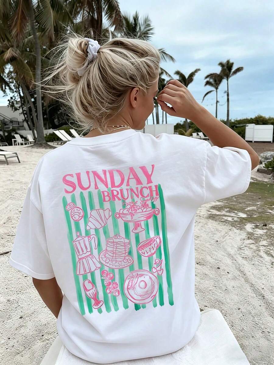 T-shirt a maniche corte in stile retrò americano con stampa a righe, morbida e dalla vestibilità ampia, perfetta per il brunch del domenica da donna, un capo energico e comodo per incontri del fine settimana, caffè e uscite in città. - Bianco - Visualizzare 1