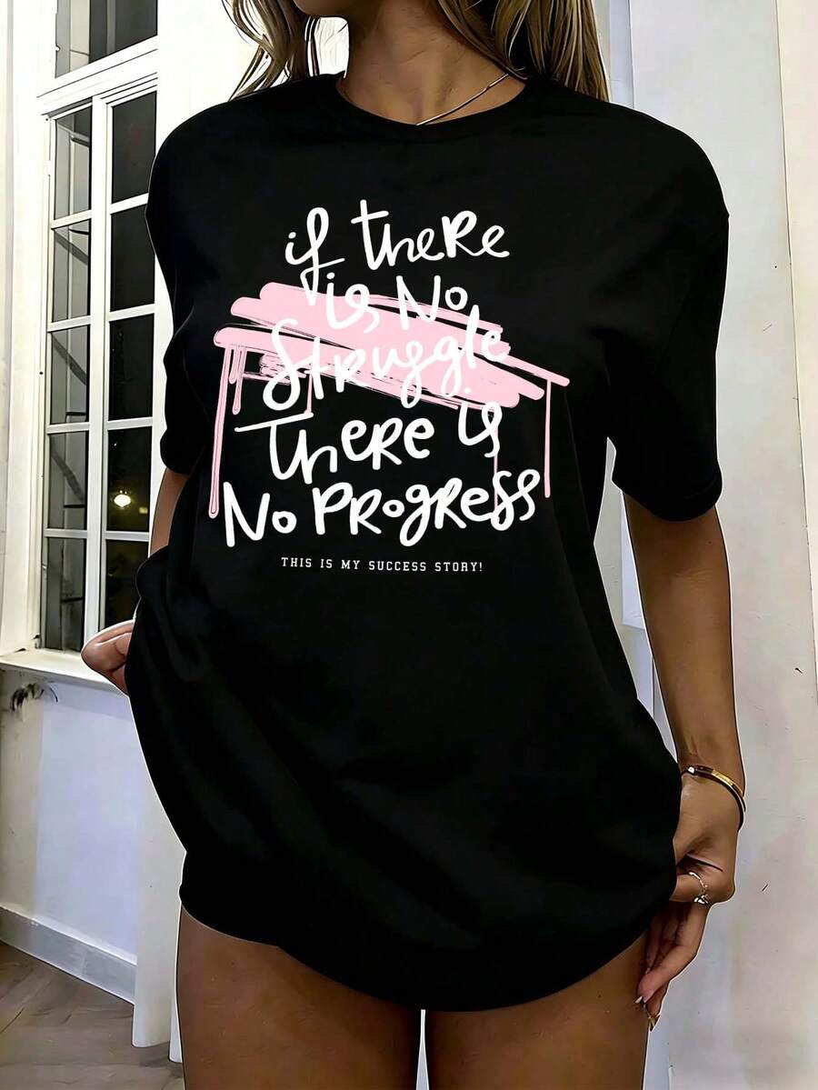 Camiseta negra de manga corta, cuello redondo y holgada para mujer, con estampado de texto inspirador y detalles de pintura rosa, camiseta casual de estilo urbano - Negro - Ver 1