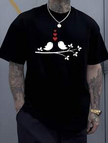 Dos pájaros negros sobre rama con hojas y corazones rojos simbolizando amor romántico camiseta de hombre casual moderna - Negro - Ver 1
