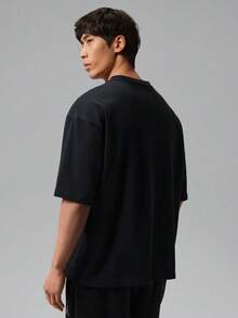Jordan Men's AS FLT GFX OVSZ SS CREW Short Sleeve Knit Collarless T-Shirt TIF3134-010 - Black - View 2