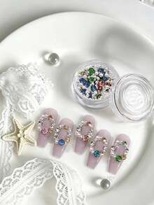 1 Box Mixed Nail Art Decorations, Colorful Rhinestones Paired With Pearls, Metal Chains And Star Accents, Rich Colors And Sparkling Texture, Suitable For Christmas Theme Nail Art, Can Create Christmas Tree, Wreath And Other Styles, Easily Create Holiday Atmosphere, Beginners Can Easily Use, Suitable For Daily Commute, Dates, Parties, Wide Range Of Uses, High Cost-Performance Nail Charms - Multicolor - View 1