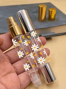 عبوة عطر صغيرة للسفر قابلة لإعادة التعبئة بطبعة زهرة البابونج، 10 مل، موزع عطر مزدوج الرأس 2 في 1 مع وظيفة الكرة الدوارة والرش، زجاجة مستحضرات تجميل بنمط طبعة زهرة البابونج والقلب، موزع رش عطر للسفر - متعدد الألوان - مشاهدة 8