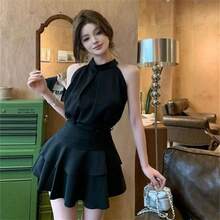 Conjunto de Dos Piezas Elegante y Sofisticado para el Verano 2026: Top con Volantes y Falda para Mujer - Negro - Ver 1