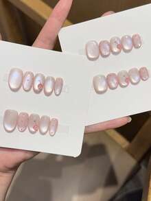 10 Buah Kuku Tempel Oval Pendek/Sedang Buatan Tangan, Warna Pink Transparan, Bentuk Mata Kucing, Titik-titik Pink Kecil & Buah Ceri Mengkilap 3D, Gaya Minimalis Lembut dan Manis. Cocok untuk Wanita dan Anak Perempuan di Musim Semi, Musim Panas, Musim Gugur, Musim Dingin, Festival, Liburan, Pesta, dan Penggunaan Sehari-hari. - Baby Pink - View 1