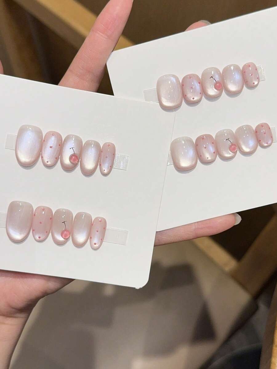 10 Buah Kuku Tempel Oval Pendek/Sedang Buatan Tangan, Warna Pink Transparan, Bentuk Mata Kucing, Titik-titik Pink Kecil & Buah Ceri Mengkilap 3D, Gaya Minimalis Lembut dan Manis. Cocok untuk Wanita dan Anak Perempuan di Musim Semi, Musim Panas, Musim Gugur, Musim Dingin, Festival, Liburan, Pesta, dan Penggunaan Sehari-hari. - Baby Pink - View 1