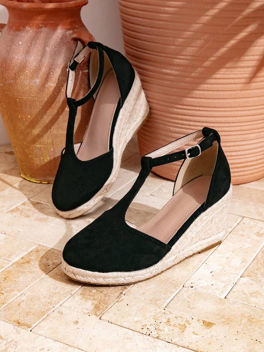 Sandalias negras de mujer con suela gruesa, correa en T con hebilla, punta cerrada, tacón de cuña, plataforma tejida y tacón alto, estilo vacacional para verano - Negro - Ver 1