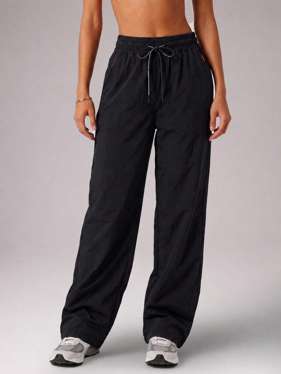 CZRLHYT Women's Drawstring Zipper Pocket Woven Pants, Multi-Functional Loose Pants For Outdoor Activities - Black - View 1