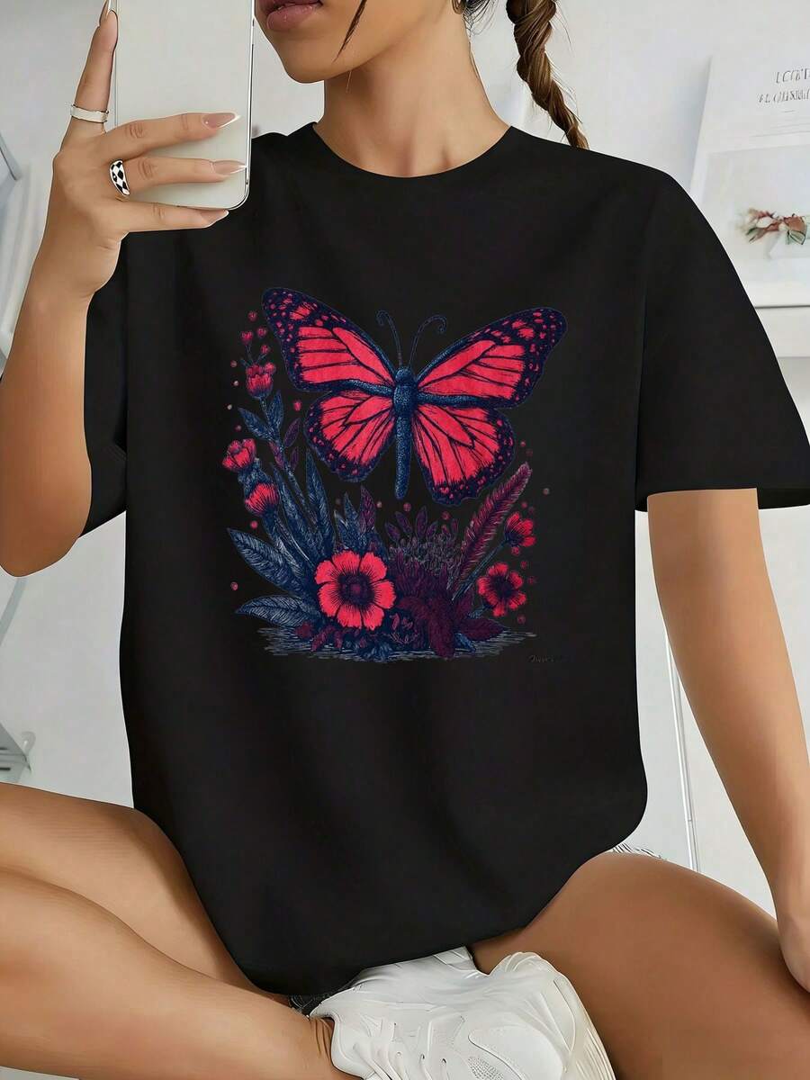 Women's Black Casual T-Shirt With A Design Of Bright Pink Butterflies, Black And Blue Wings, Pink Flowers, And Dark Green Leaves. The Material Is... - 黑色 - 查看 1