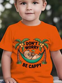 Fashionable Short-Sleeved T-Shirt For Children In Summer With The Print "DON'T WORRY BE CAPPY" And A Cartoon Capybara Lying In A Green Hammock Among Coconut Trees, Casual Top For E - 酒紅色 - 查看 1