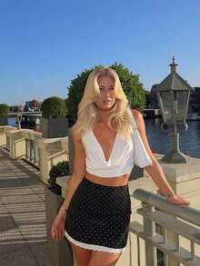 Women's Black Short A-Line Skirt With Charming Polka Dot Print And Delicate Lace Details, Perfect For Vacation Outfits - Black - View 3