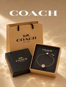 Pulsera Coach Tono Oro Rosa, Logotipo de Carruaje Redondo con Strass, Cadena Delicada Ajustable Joyería Diaria para Mujeres - Oro rosa - Ver 1