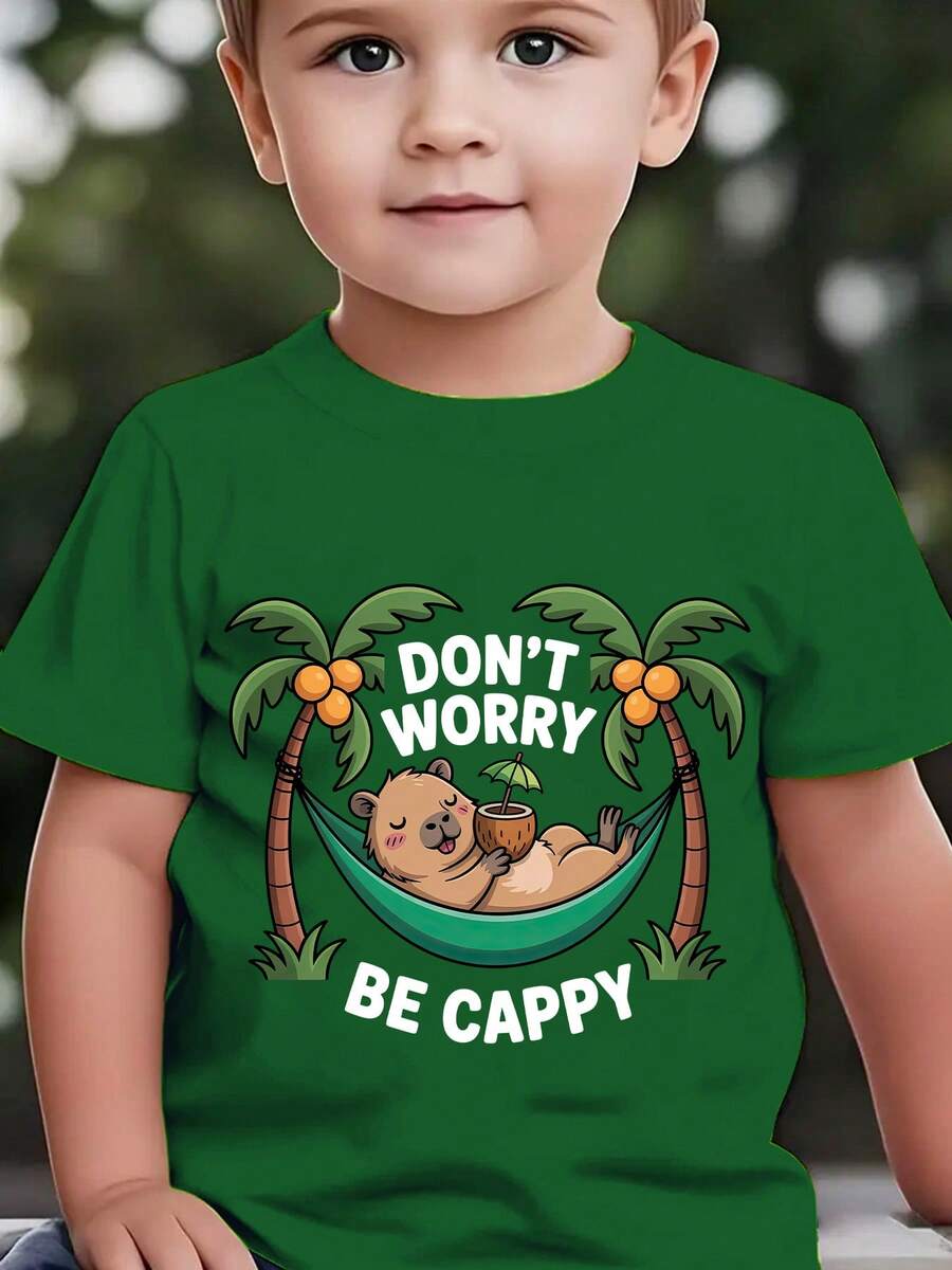 Fashionable Short-Sleeved T-Shirt For Children In Summer With The Print "DON'T WORRY BE CAPPY" And A Cartoon Capybara Lying In A Green Hammock Among Coconut Trees, Casual Top For E - 墨綠色 - 查看 1