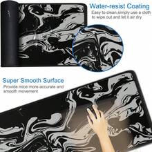 1件電競滑鼠墊 15.7x35.4英吋 (40*90cm) 大型加長電腦鍵盤滑鼠墊，防水防滑橡膠底長款XXL桌面滑鼠墊，適用電競、辦公與居家，大理石白 - 流體黑白 - 查看 3