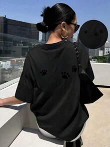 Spring And Summer Collection With A Short Sleeve Round Neck T-Shirt Decorated With An Adorable Paw Print Design On The Back, Perfect For Casual And Versatile Use. - Black - View 1