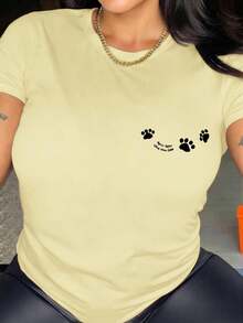 Colección de Primavera y Verano con una Camiseta de Manga Corta y Cuello Redondo Decorada con un Adorable Diseño de Huella de Pata en la Espalda, Perfecta para un Uso Casual y Versátil. - Amarillo - Ver 2