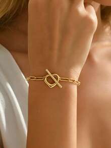 1 Peça Pulseira Feminina de Aço Inoxidável com Fecho OT, Estilo de Pulseira Fina com Corrente de Elos Retangulares, Núcleo de Fecho em Forma de T com Coração Oco, Estilo Minimalista de Luxo Francês Ins, Cor Dourada, Não Oxida e Não Desbota, Adequada para Uso Diário, Compras, Encontros, Viagens, Perfeita como Presente de Acessório de Atmosfera Suave para Aniversário, Dia dos Namorados, Melhor Amiga, Namorada - Pulseira - Visão 1