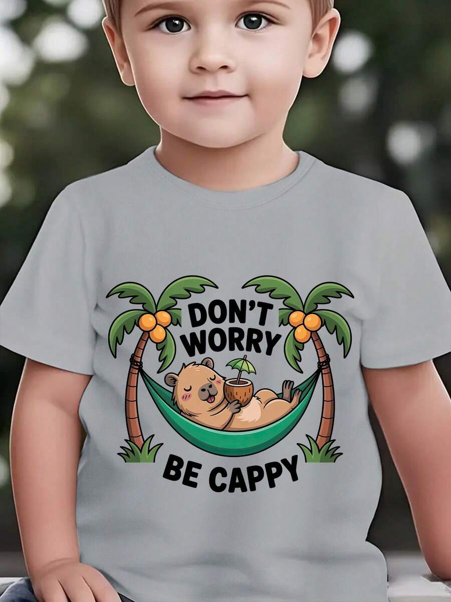 Fashionable Short-Sleeved T-Shirt For Children In Summer With The Print "DON'T WORRY BE CAPPY" And A Cartoon Capybara Lying In A Green Hammock Among Coconut Trees, Casual Top For E - 灰色 - 查看 1