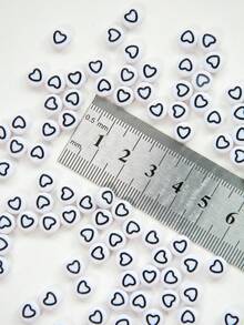 100-1000 pièces Perles en acrylique en forme de cœur, motif cœur avec goutte d'huile blanche et ligne noire, pour la fabrication de bijoux, les loisirs créatifs - Fond blanc avec des lignes noires et une forme de cœur - Voir 6