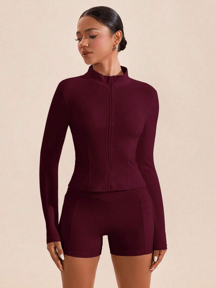 Conjunto deportivo mujer tela suave ajustada absorbe humedad chaqueta cremallera cuello alto pantalones cortos sin transparencia deportivo elegante Varios Colores Disponibles - Color caoba - Ver 1