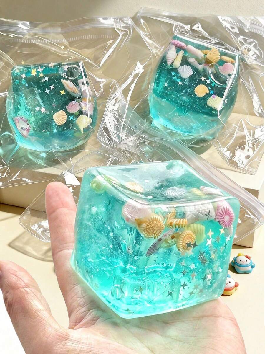 海洋主題感官紓壓方塊，裝飾有卡通貝殼、海螺、魚和冰淇淋元素，營造海洋派對氛圍，有效緩解焦慮，適合戶外空間與辦公環境