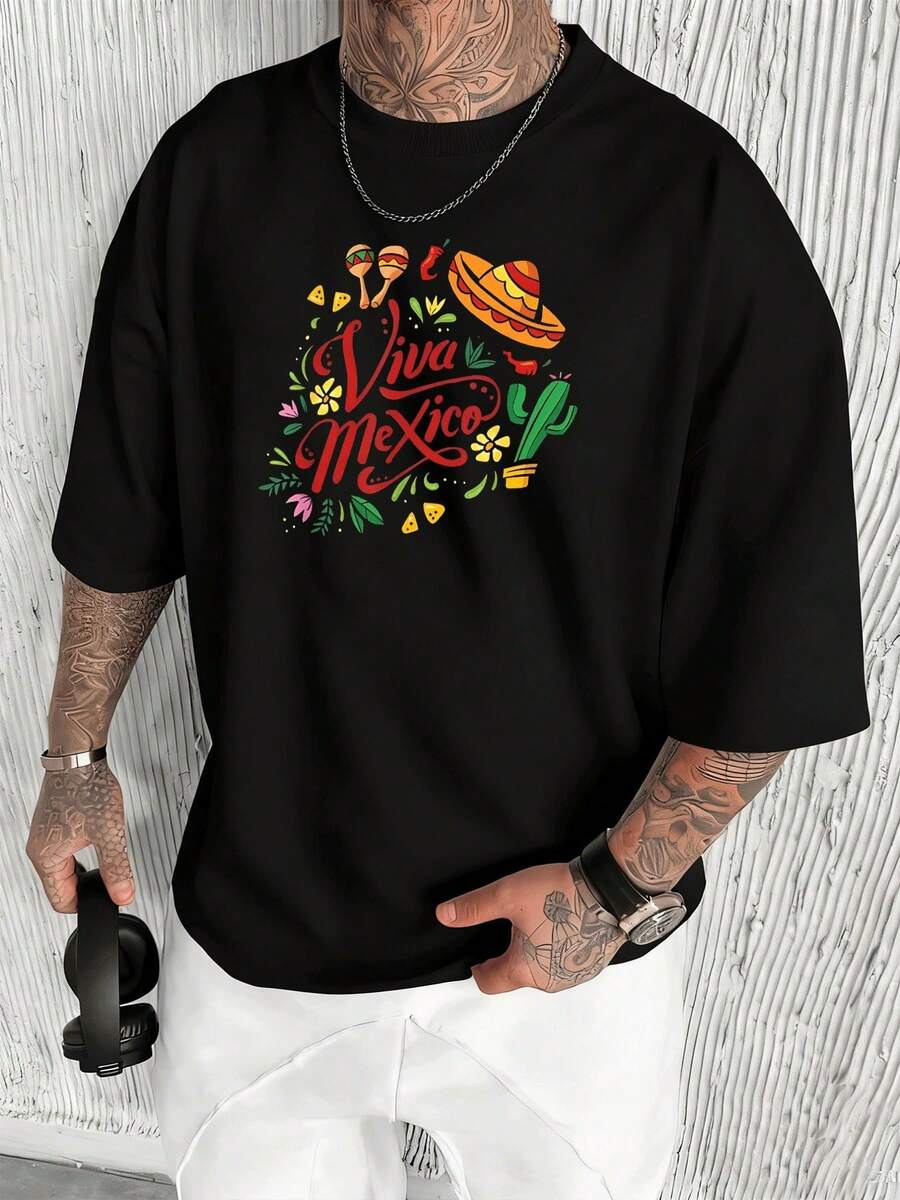 Men's T-Shirt. Vibrant Celebration Of Viva Mexico With Mariachi Hat, Maracas, And Cactus Adorned With Flowers Represents The Festive Spirit And Rich Mexican Culture. Family Celebration. - 黑色 - 查看 1