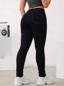 Jeans ajustados básicos de mezclilla basico, elásticos, con efecto levantador de glúteos - color primario - Ver 4
