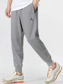Nike Jordan Dri-FIT Sport Solid Color Logo Print Elastic Waist Jogger Quick-Drying Knit Sweatpants, Men's, Grey - Grey - View 1
