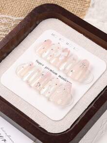 10片中長款棺材形手工穿戴甲,甜美女孩風漸層柔粉裸色亮片假指甲,飾有3D白色蝴蝶結、迷你銀色蝴蝶結、愛心水鑽與珍珠流蘇,適合夏季旅行搭配 - 淺粉色 - 查看 3
