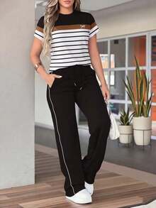Conjunto informal de 2 piezas para primavera/verano, con top de manga corta de color contrastante y pantalones de cintura ceñida de unicolor. Ajuste favorecedor y cómodo apto para uso diario - Negro - Ver 1