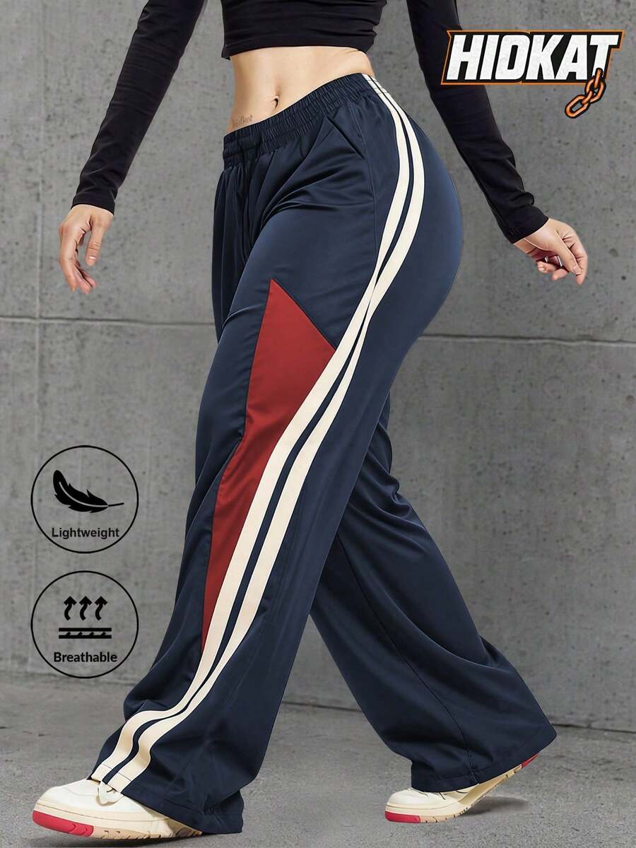Pantalones largos de mujer con diseño de patchwork de colores, de corte holgado y largo, con detalles de patchwork de colores contrastantes que realzan el look, adecuados para uso diario y c