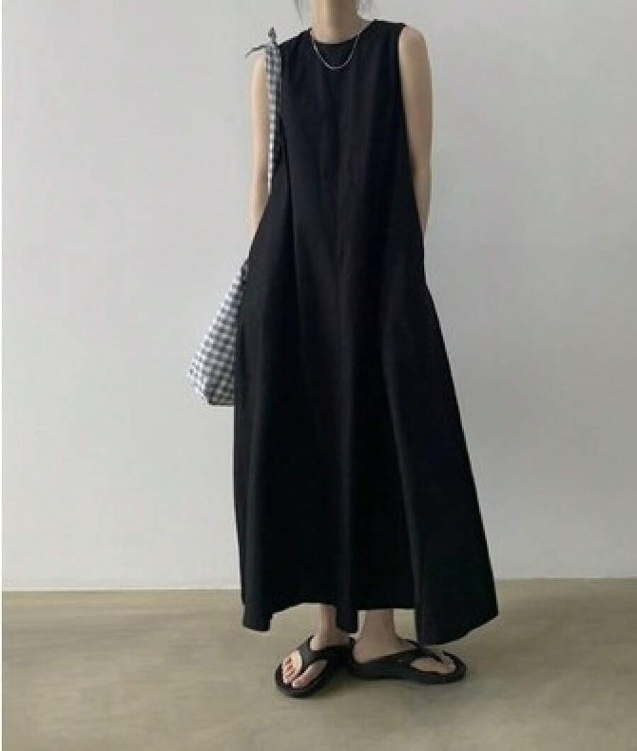 Vestido largo de lino y algodón, holgado, sin mangas, color calabaza. - Negro - Ver 1