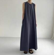 Vestido largo de lino y algodón, holgado, sin mangas, color calabaza. - Negro - Ver 9