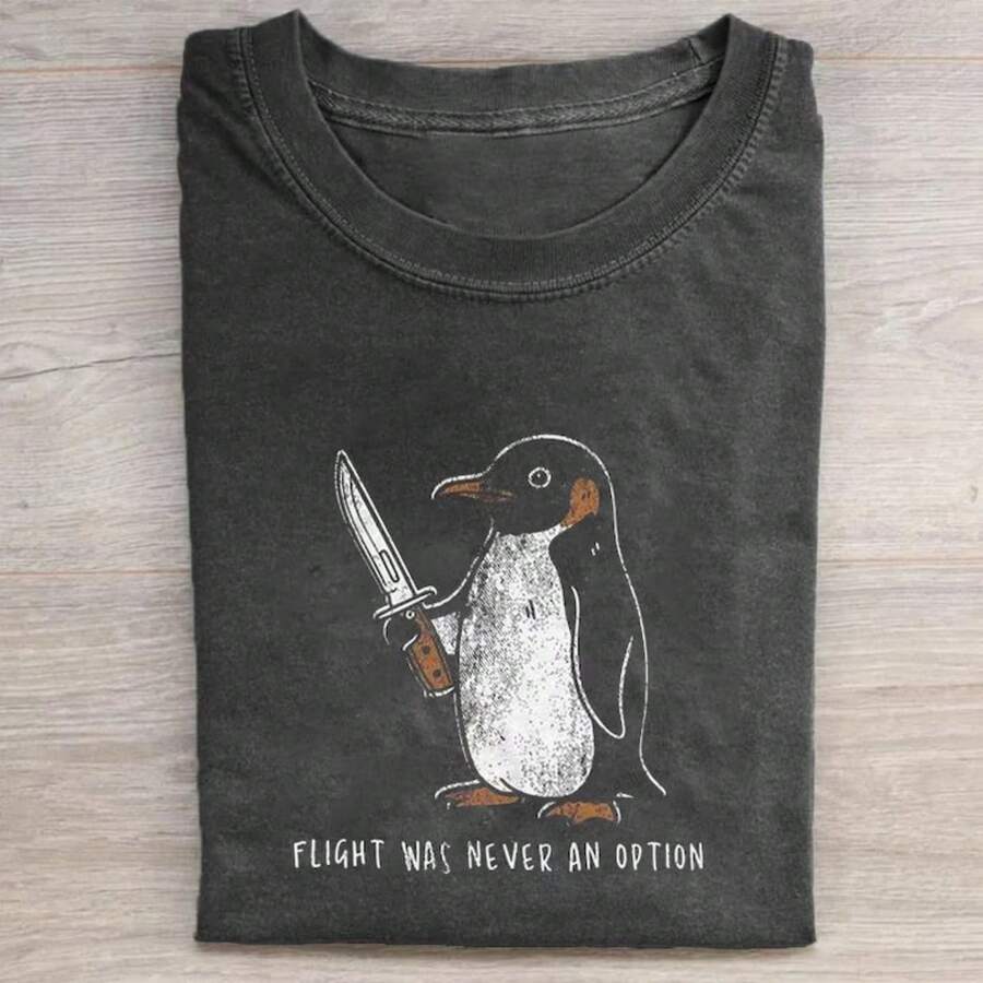 Camiseta informal de algodón de manga corta y cuello redondo con estampado gráfico de pingüino, bajo y largo regulares, tejido elástico suave para viajes y fiestas. - Negro - Ver 1