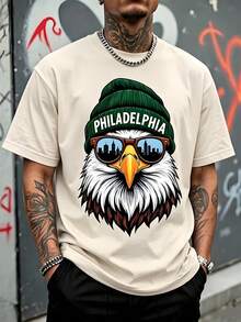 Camiseta de hombre Holgada, Estampado Águila Calva con Gorro de Lana Verde "Filadelfia" y Gafas con Silueta de Ciudad,Playera Manga Corta Estilo Urbano Americano Streetwear. - Albaricoque - Ver 8
