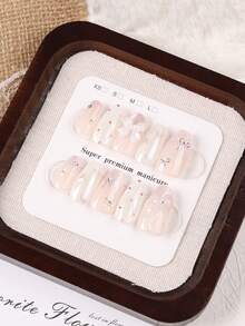 10片中長款棺材形手工穿戴甲,甜美女孩風漸層柔粉裸色亮片假指甲,飾有3D白色蝴蝶結、迷你銀色蝴蝶結、愛心水鑽與珍珠流蘇,適合夏季旅行搭配 - 淺粉色 - 查看 7