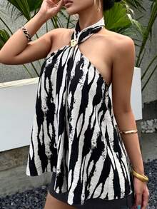 Top sin espalda con estampado de cebra francés nuevo para verano 2026, sin mangas con cuello halter y decoración de metal, estilo vintage casual para vacaciones en la playa - Blanco y Negro - Ver 4