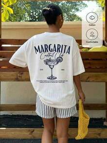 Camiseta  de estilo casual y holgado para vacaciones, 62% algodón, con diseño minimalista de letras dibujadas a mano y un gráfico de limón, cuello redondo, mangas cortas, corte holgad - Multicolor - Ver 1