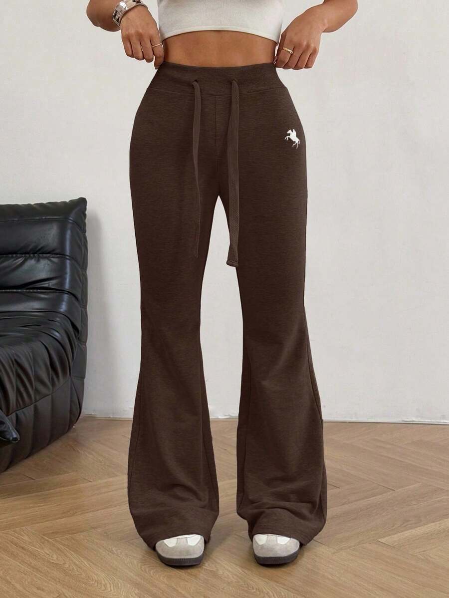 Pantalones acampanados con bordados para mujer, diseño de moda adecuado para el verano - Marrón - Ver 1