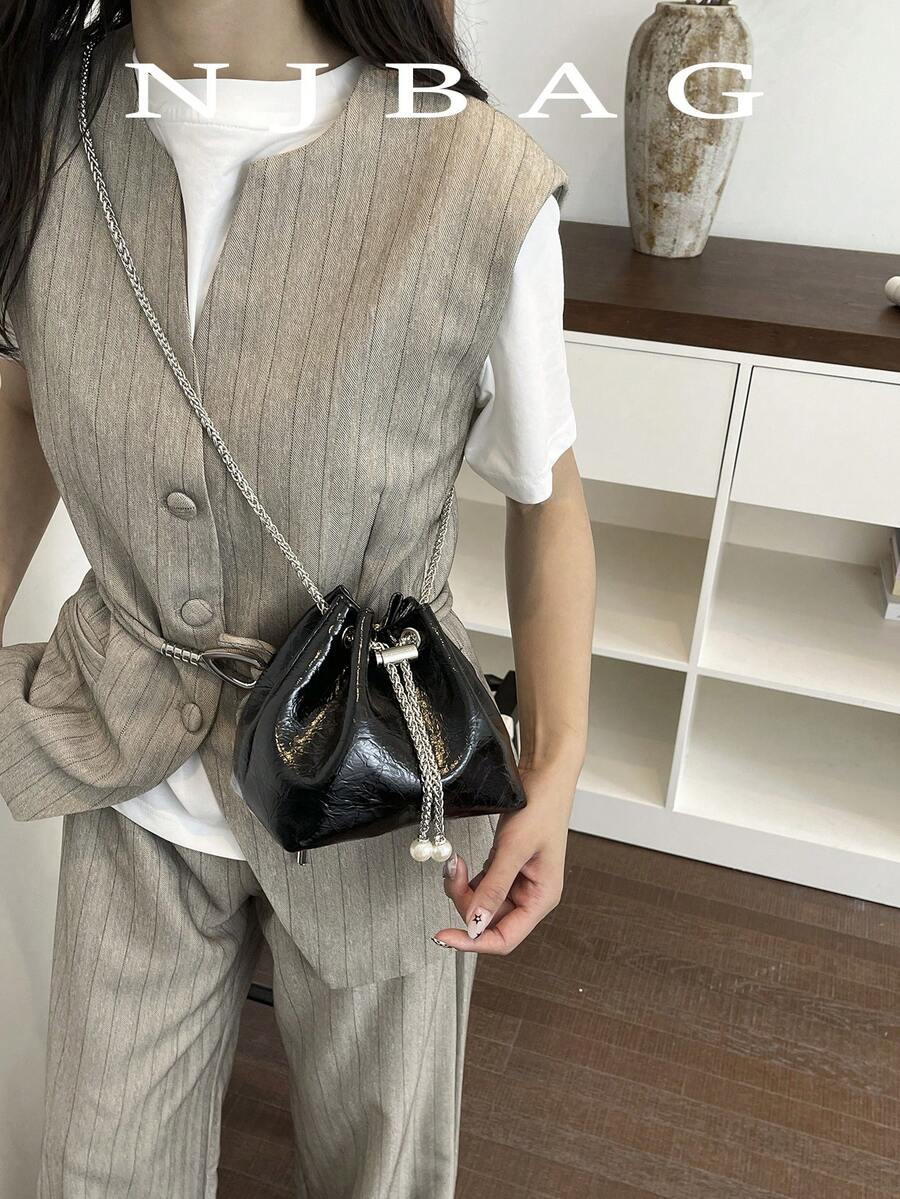 迷你水桶包，復古圖案，抽繩封口，適合派對與休閒穿著的斜挎包，極簡設計，可作為單肩包、斜挎包、後背包，多種背法