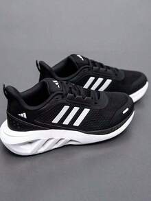Adidas 阿迪達斯男女同款中性2025年新款休閒鞋網面舒適輕便避震運動鞋跑步鞋 - 黑色 - 查看 1