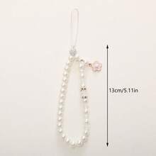 2 Estilos Correa de Muñeca para Teléfono con Cuentas de Perlas Falsas y Flores, Elegante Cordón para Teléfono con Cristales de Strass, Decoración para Bolso, Llave y Auriculares para Mujeres y Niñas - Pulsera de perlas y camelias - Ver 2
