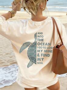 1packCamiseta casual de cuello redondo de manga corta con estampado de tortuga "Into The Ocean" de corte holgado para mu playera de méxico tops - Albaricoque - Ver 1