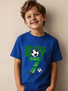 Boy's Number 7 Birthday Party T-Shirt, Featuring A "Birthday Boy" Print In Green Lettering, A Casual Short-Sleeved Sporty Style With Stadium Numbers And A Soccer Ball Design. - Biru - View 1