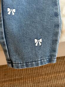 Bộ 2 món bé gái gồm áo cổ tròn tay dài và quần dài denim - Đỏ - Xem 8