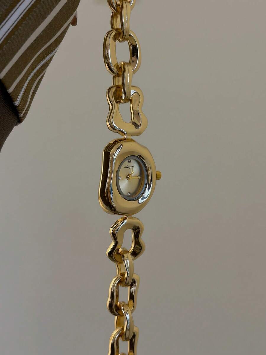Reloj de cuarzo para mujer con esfera asimétrica y correa estilo brazalete – Diseño artístico exquisito adecuado para uso diario, regalos y eventos formales. - Dorado - Ver 1
